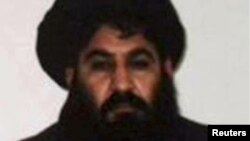 Mullah Akhtar Mohammad Mansoor, Taliban militants' new leader, is seen in this undated handout photograph by the Taliban. 