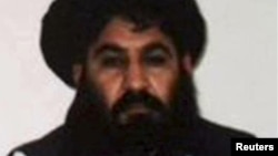 FILE - Mullah Akhtar Mohammad Mansoor, Taliban militants' new leader, is seen in this undated handout photograph by the Taliban. Unconfirmed reports suggest the leader was killed in a shootout in Quetta.