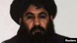 Mullah Akhtar Mohammad Mansoor, Taliban militants' new leader, is seen in this undated handout photograph by the Taliban.