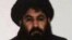 FILE- Mullah Akhtar Mohammad Mansour, Taliban militants' leader, is seen in this undated handout photograph by the Taliban. After days of widespread reports that he had been seriously wounded in a gunfight with rival militant commanders, the Islamist insurgency released a voice message from its chief to prove he is alive.