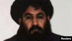 FILE - Mullah Akhtar Mansoor, leader of the Afghan Taliban, is seen in this undated handout photo from the Taliban.