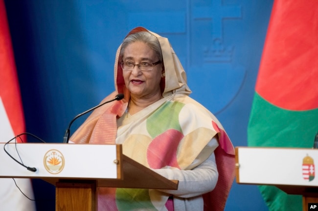 FILE - Bangladeshi Prime Minister Sheikh Hasina speaks at a news conference in Budapest, Hungary, Nov. 29, 2016. Leaders of the opposition Bangladesh Nationalist Party have accused the Hasina-led government of not making public details of an agreement she