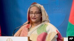 FILE - Bangladeshi Prime Minister Sheikh Hasina speaks at a news conference in Budapest, Hungary, Nov. 29, 2016. Leaders of the opposition Bangladesh Nationalist Party have accused the Hasina-led government of not making public details of an agreement she's set to sign with India.