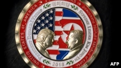 A coin for the upcoming U.S.-North Korea summit is seen in Washington, May 21, 2018. 