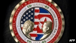 A coin for the upcoming U.S.-North Korea summit is seen in Washington, May 21, 2018. 