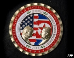 A coin for the upcoming U.S.-North Korea summit is seen in Washington, May 21, 2018.