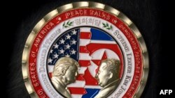 A coin for the upcoming U.S.-North Korea summit is seen in Washington, May 21, 2018. 