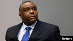 FILE - Jean-Pierre Bemba Gombo of the Democratic Republic of the Congo sits in the courtroom of the International Criminal Court (ICC) in The Hague, June 21, 2016.
