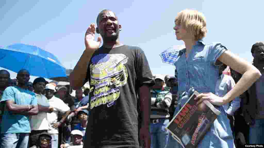 Shange supports another WASP leader addressing a protest near Johannesburg. (Courtesy WASP) 