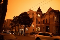 A view of the area along Geary and O'Farrell Streets as an orange wildfire haze blankets San Francisco,