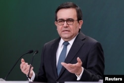 FILE - Mexico's Economy Minister Ildefonso Guajardo gestures during a news conference at Los Pinos presidential residence in Mexico City, Mexico, May 1, 2018.