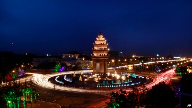 A traffic photo at the Cambodian Independence Monument. (AP Photo/Heng Sinith)