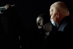 Democratic presidential candidate former Vice President Joe Biden arrives at New Castle Airport in New Castle, Del., Oct. 1, 2020, after speaking at United Food & Commercial Workers Union Local 951 in Grand Rapids, Mich.