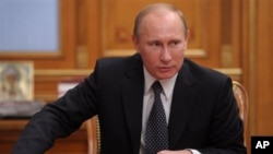 Russian Prime Minister Vladimir Putin speaks during a cabinet meeting in Moscow, Russia, December 26, 2011.
