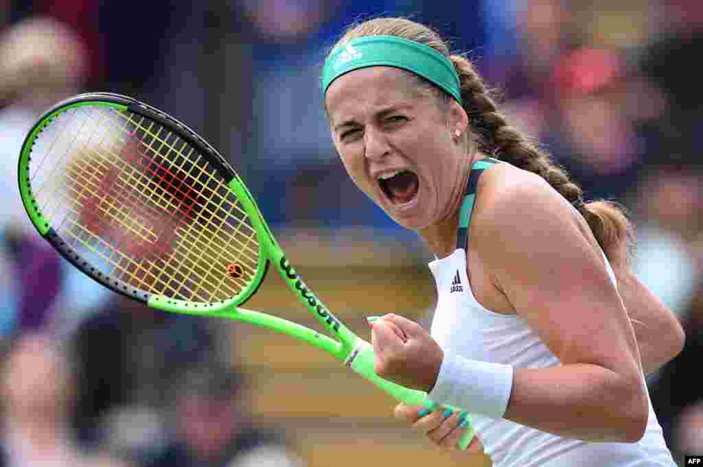 Latvia&#39;s Jelena Ostapenko celebrates after winning the second set against Britain&#39;s Johanna Konta during their women&#39;s singles third round tennis match at the ATP Aegon International tennis tournament in Eastbourne, southern England.