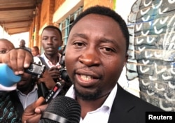 Green Party presidential candidate Frank Habineza addresses the media after casting his vote in Kigali, Rwanda, Aug. 4, 2017.