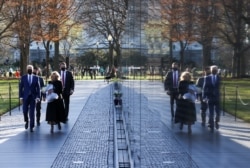 FILE - U.S. President Joe Biden and U.S. first lady Dr. Jill Biden visit the Vietnam Veterans Memorial to mark National Vietnam War Veterans Day, in Washington, U.S., March 29, 2021. REUTERS/Jonathan Ernst