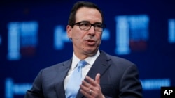 លោក Steve Mnuchin ថ្លែង​នៅ​ក្នុង​កិច្ចពិភាក្សា​មួយ​នៅ​ក្នុង​សន្និសីទ Milken Institute Global Conference កាលពី​ថ្ងៃទី៣០ ខែមេសា​ ឆ្នាំ២០១៨។