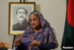 FILE - Bangladeshi Prime Minister Sheikh Hasina speaks during an interview at Grand Hyatt Hotel in Manhattan, New York, Sept. 25, 2018.