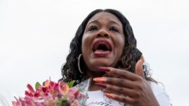Rep. Cori Bush, D-Mo., cries after it was announced that the Biden administration will enact a targeted nationwide eviction moratorium outside of Capitol Hill in Washington on Tuesday, August 3, 2021.