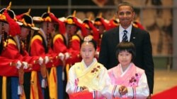 President Obama is welcomed to a G-20 dinner in Seoul on Thursday
