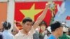 A protester gestures as he marches during an anti-China protest in Vietnam's southern Ho Chi Minh city, May 18, 2014. 