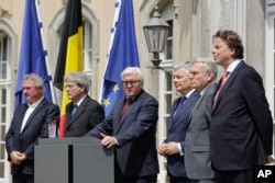 The Foreign Ministers from EU's founding six Jean Asselborn from Luxemburg, Paolo Gentiloni from Italy, Frank-Walter Steinmeier from Germany, Didier Reynders from Belgium, Jean-Marc Ayrault from France and Bert Koenders from the Netherlands, from left
