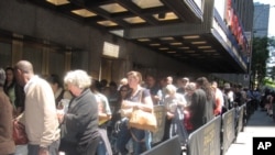 People line up at Radio City Music Hall in New York to hear the Dalai Lama speak.