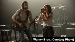 A scene from "A Star is Born" with Bradley Cooper and Lady Gaga. 