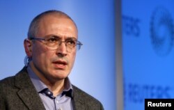 FILE - Former Russian tycoon Mikhail Khodorkovsky speaks during a Reuters Newsmaker event at Canary Wharf in London, Britain.