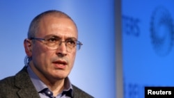 FILE - Former Russian tycoon Mikhail Khodorkovsky speaks during a Reuters Newsmaker event at Canary Wharf in London, Britain.