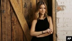 Maren Morris poses in Nashville, Tennessee, June 1, 2016. 