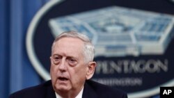 FILE - Defense Secretary Jim Mattis speaks during a news conference at the Pentagon.