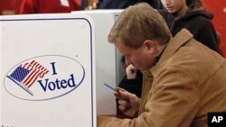 U.S. Rep. Scott Murphy, D-N.Y., votes at Glens Falls High School in Glens Falls, N.Y, 02 Nov 2010