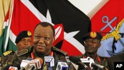 General Julius Karangi, Kenyan (CDF) Chief of the Defense Force, speaks to journalists at a military press briefing in Nairobi. Kenya, October 29, 2011.