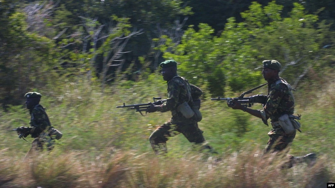 FILE - Kenyan soldiers participate in a joint military exercise with US Marines near the coastal town of Lamu in this Jan. 15, 2004 photo. 