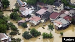 Vista aérea de un área residencial en Kyoto, donde las inundaciones provocaron la muerte de al menos 27 personas.