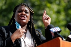 In this Aug. 5, 2020, file photo, Activist Cori Bush speaks during a news conference, Aug. 5, 2020, in St. Louis.