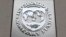 The International Monetary Fund (IMF) logo is seen at the IMF headquarters building during the 2013 Spring Meeting of the International Monetary Fund and World Bank in Washington, April 18, 2013. 