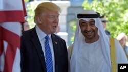 FILE - President Donald Trump welcomes Abu Dhabi's Crown Prince Sheikh Mohammed bin Zayed Al Nahyan to the White House in Washington, May 15, 2017. 