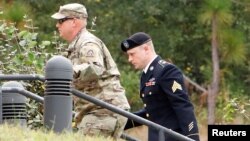 Sgt. Robert B. Bergdahl (R) arrives at the court house for a hearing in the case of United States vs. Bergdahl in Fort Bragg, North Carolina, U.S., Oct. 16, 2017. 