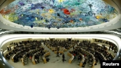 FILE - The U.N. Human Rights Council is pictured via a fisheye lens in Geneva, Switzerland