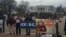 Protesters gather outside the White House in Washington Jan. 15, 2016, calling for an end to immigration raids. (K. Gypson/VOA) 