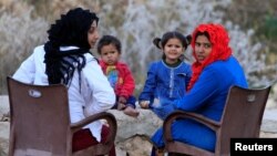 Syrian refugees in Ain Baal village, near Tyre, in southern Lebanon, Nov. 27, 2017. Poverty is forcing a growing number of Syrian refugee girls to become wives.