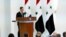 In this photo released by the official Facebook page of the Syrian presidency, Bashar al-Assad speaks after being sworn in for a fourth seven-year term, at the Syrian Presidential Palace in Damascus, July 17, 2021.