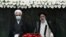 President Ebrahim Raisi, right, takes his oath as president, as Judiciary Chief Gholamhossein Mohseni Ejehi listens in a ceremony at the parliament in Tehran, Iran, Aug. 5, 2021.