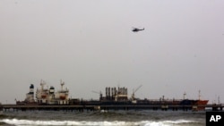 FILE - The Iranian tanker Fortune is anchored at the El Palito refinery near Puerto Cabello, Venezuela, May 25, 2020. Fuel shortages have led Venezuela to seek relief from Iran, which in May sent five tankers of gasoline to the South American nation.
