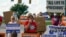 Sister Barbara Battista speaks to death penalty protesters across the street from the federal prison complex in Terre Haute, Ind., Aug. 26, 2020. Lezmond Mitchell was later put to death in the prison for two killings that occurred nearly two decades ago.