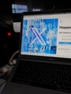 FILE - A view of a laptop shows the X sign-in page with its logo, in Belgrade, Serbia, July 24, 2023. X is battling a court ruling that sought to shut down its operation in Brazil. 