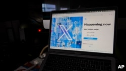 FILE - A view of a laptop shows the X sign-in page with its logo, in Belgrade, Serbia, July 24, 2023. X is battling a court ruling that sought to shut down its operation in Brazil. 